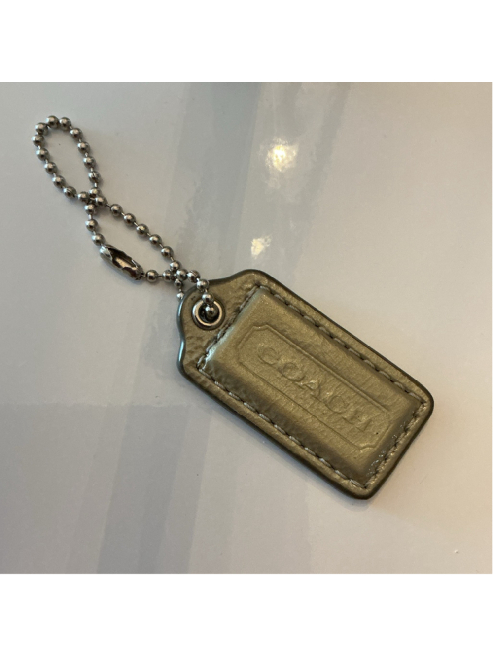 Coach Pewter Metallic Bag Tag